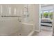 Beautiful glass shower featuring a built-in bench, rainfall shower head, and stylish tile at 15921 E Ridgestone Dr, Fountain Hills, AZ 85268