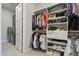 Spacious walk-in closet with custom shelving and hanging space, perfect for organizing clothes and accessories at 15921 E Ridgestone Dr, Fountain Hills, AZ 85268