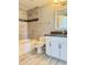 Bathroom featuring tub, shower, toilet, and vanity at 1701 E Colter St # 226, Phoenix, AZ 85016