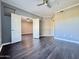 Bedroom featuring grey walls, hardwood floors, and white doors at 1701 E Colter St # 226, Phoenix, AZ 85016