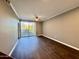 Open living room with hardwood floors and a balcony view at 1701 E Colter St # 226, Phoenix, AZ 85016