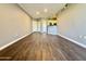 Spacious living room with wood-look flooring, recessed lighting, and neutral color palette at 1701 E Colter St # 226, Phoenix, AZ 85016