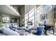 A stylish community living room features a fireplace, piano, and comfortable seating at 1701 E Colter St # 226, Phoenix, AZ 85016