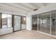 Enclosed patio features tiled flooring and sliding glass doors that lead indoors at 1713 E Westchester Dr, Tempe, AZ 85283