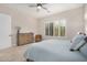 Bedroom featuring natural light, a ceiling fan, and plantation shutters on the windows at 1752 N Harper --, Mesa, AZ 85207