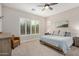 Comfortable bedroom with plantation shutters on the window and a calming color palette at 1752 N Harper --, Mesa, AZ 85207
