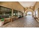 Beautiful clubhouse interior with stone floors, archways, and comfortable seating at 1752 N Harper --, Mesa, AZ 85207