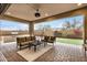 Inviting covered patio with BBQ, brick pavers, and outdoor seating area perfect for entertaining and relaxation at 1752 N Harper --, Mesa, AZ 85207