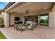 Entertain on this covered patio with brick pavers that connects to the home through sliding glass doors at 1752 N Harper --, Mesa, AZ 85207