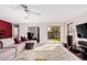 Bright living room features a ceiling fan, neutral tones and a sliding door at 18611 N 22Nd St # 23, Phoenix, AZ 85024