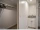 Bright hallway featuring laundry closet, utility sink with counter and access to bathroom at 200 S 4Th St, Avondale, AZ 85323