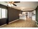 Contemporary kitchen with white cabinets, granite counters, and stainless steel appliances at 200 S 4Th St, Avondale, AZ 85323