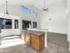 Bright living room features neutral tones, high ceilings, and large windows at 2014 S Archer Cir, Mesa, AZ 85209