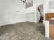 Spacious living room with high ceilings and staircase, and lots of natural light at 2014 S Archer Cir, Mesa, AZ 85209