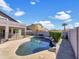 Beautiful backyard pool with lush landscaping, perfect for relaxation and entertainment at 2014 S Archer Cir, Mesa, AZ 85209