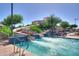 Community splash pad waterpark featuring slides and a pool for summertime fun at 208 S La Amador Trl, Casa Grande, AZ 85194