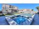 Inviting backyard with a sparkling pool, hot tub, and trampoline for outdoor entertainment at 20867 N Grantham Rd, Maricopa, AZ 85138