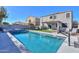 Spacious backyard with a pool, hot tub, trampoline, and plenty of room to play at 20867 N Grantham Rd, Maricopa, AZ 85138