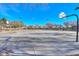 Community basketball court in the Homestead community with mature landscaping and picnic areas at 20867 N Grantham Rd, Maricopa, AZ 85138