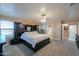 A bright bedroom with carpet, and a ceiling fan at 20867 N Grantham Rd, Maricopa, AZ 85138