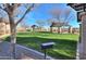Community park with grill, covered picnic areas and mature landscaping in the Homestead community at 20867 N Grantham Rd, Maricopa, AZ 85138