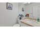 Well-lit bathroom featuring a marble countertop, modern fixtures, and elegant decor at 2158 W Peninsula Cir, Chandler, AZ 85248