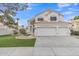 Front exterior features a three-car garage, manicured lawn, and tile roof at 2158 W Peninsula Cir, Chandler, AZ 85248