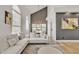 Open-concept living room with vaulted ceilings, bright white decor, and a view to the dining area at 2158 W Peninsula Cir, Chandler, AZ 85248