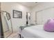 Inviting bedroom with sliding closet doors, stylish mirror, and a comfortable bed at 21842 E Via De Olivos --, Queen Creek, AZ 85142