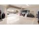 Neat garage space showing the driveway and neighborhood through the open door at 21842 E Via De Olivos --, Queen Creek, AZ 85142
