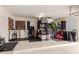 Organized garage featuring wall-mounted tools and shelving for optimal storage at 21842 E Via De Olivos --, Queen Creek, AZ 85142