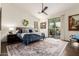 Relaxing main bedroom with ceiling fan, sliding door access to patio, and a plush rug at 21842 E Via De Olivos --, Queen Creek, AZ 85142