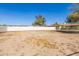 Large backyard, perfect for outdoor activities and relaxation, complemented by a well-maintained fence at 22102 W Ripple Rd, Buckeye, AZ 85326