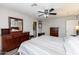 Primary bedroom features a ceiling fan and ensuite bathroom at 22102 W Ripple Rd, Buckeye, AZ 85326