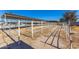 Covered horse arena, offering ample space for training and exercise, ideal for equestrian enthusiasts at 22102 W Ripple Rd, Buckeye, AZ 85326