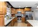 Well-lit kitchen boasts stainless steel appliances and granite countertops at 22102 W Ripple Rd, Buckeye, AZ 85326