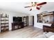 Spacious living room with stylish furniture, and a ceiling fan at 22102 W Ripple Rd, Buckeye, AZ 85326