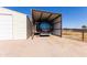Large RV parking with covered structure, and garage providing ample space and protection from the elements at 22102 W Ripple Rd, Buckeye, AZ 85326