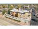 Close aerial shot of a building with ample parking, shrubbery and desert landscape at 2770 W Kent Dr, Chandler, AZ 85224