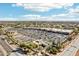 A sprawling aerial shot of shopping center showcasing a variety of retail options and convenient parking at 2770 W Kent Dr, Chandler, AZ 85224