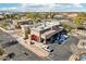 Overhead view of commercial building showcasing parking spots and desert landscape with a light blue sky at 2770 W Kent Dr, Chandler, AZ 85224