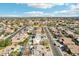 An overhead view of neighborhood pool, homes, streets, and landscaping in a residential area at 2770 W Kent Dr, Chandler, AZ 85224