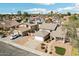 Aerial view of a suburban home with a two-car garage and manicured landscaping surrounded by similar houses at 2770 W Kent Dr, Chandler, AZ 85224