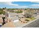 Aerial view of a two-story home with a two-car garage, and a manicured lawn surrounded by other properties at 2770 W Kent Dr, Chandler, AZ 85224