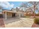 Spacious backyard with covered patio, well-maintained landscaping, and a cozy seating area at 2770 W Kent Dr, Chandler, AZ 85224