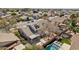 Aerial shot of a home with a backyard featuring a pool, well-kept landscaping, and a covered patio for outdoor enjoyment at 2770 W Kent Dr, Chandler, AZ 85224