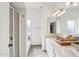 Well-lit bathroom with double sinks, shower, and vanity at 2770 W Kent Dr, Chandler, AZ 85224