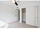 Bright bedroom with carpet flooring and closet with sliding doors at 2770 W Kent Dr, Chandler, AZ 85224