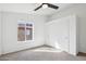 Bedroom featuring a ceiling fan and closet for plenty of storage at 2770 W Kent Dr, Chandler, AZ 85224