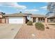 Charming single Gathering home featuring a two-car garage and low maintenance desert landscaping at 2770 W Kent Dr, Chandler, AZ 85224